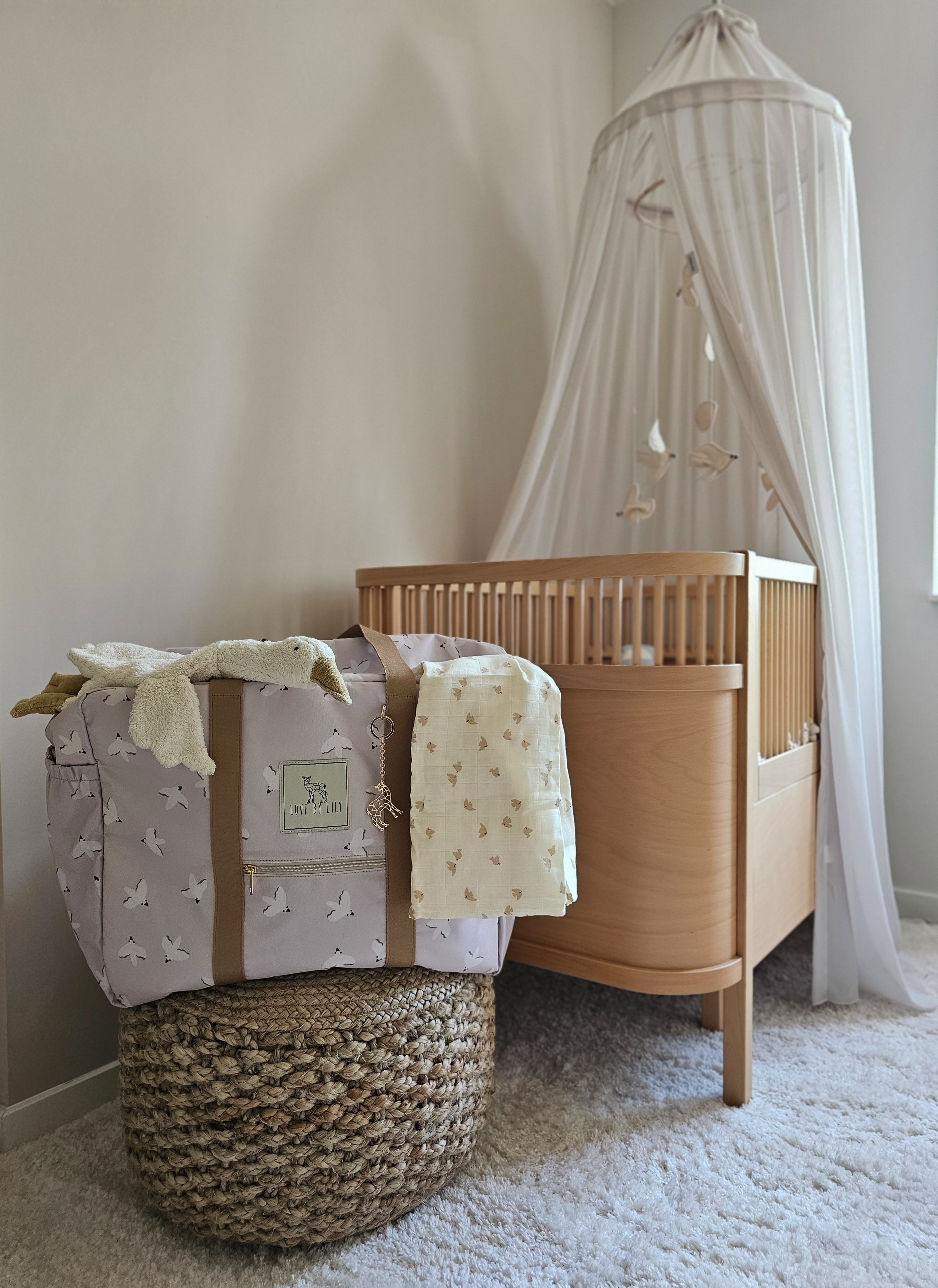 Voorzijde van de Birds Travel Mom Bag – stijlvolle en functionele luiertas