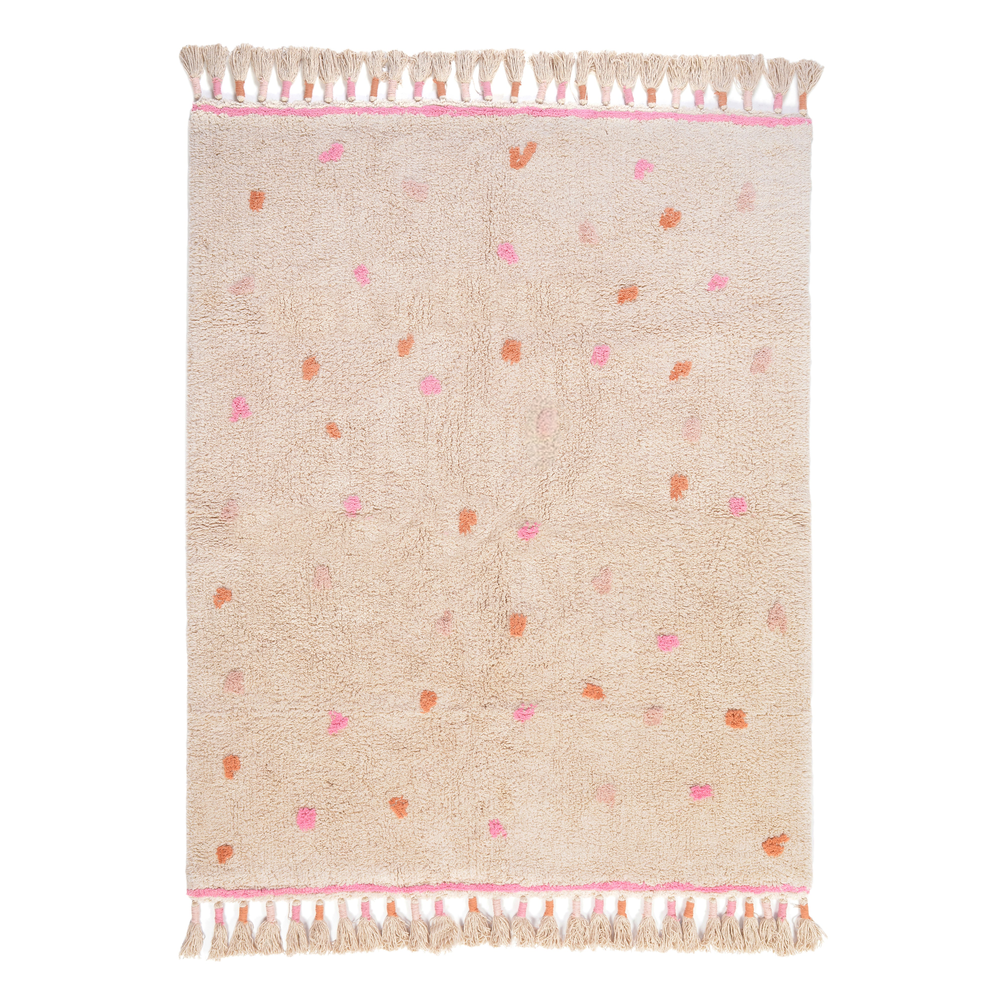 Roze vloerkleed voor meisjeskamer met franjes.