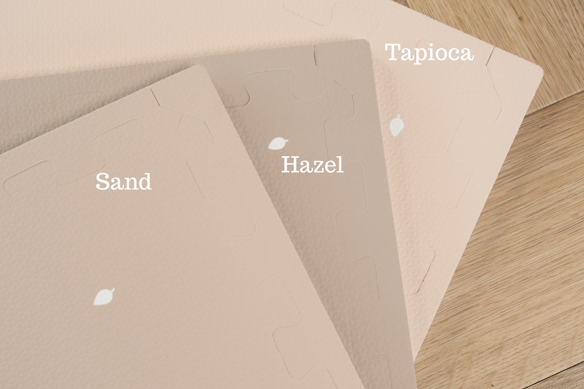 Puzzelmat Tapioca, Hazel en Sand naast elkaar – vergelijking van tinten en design