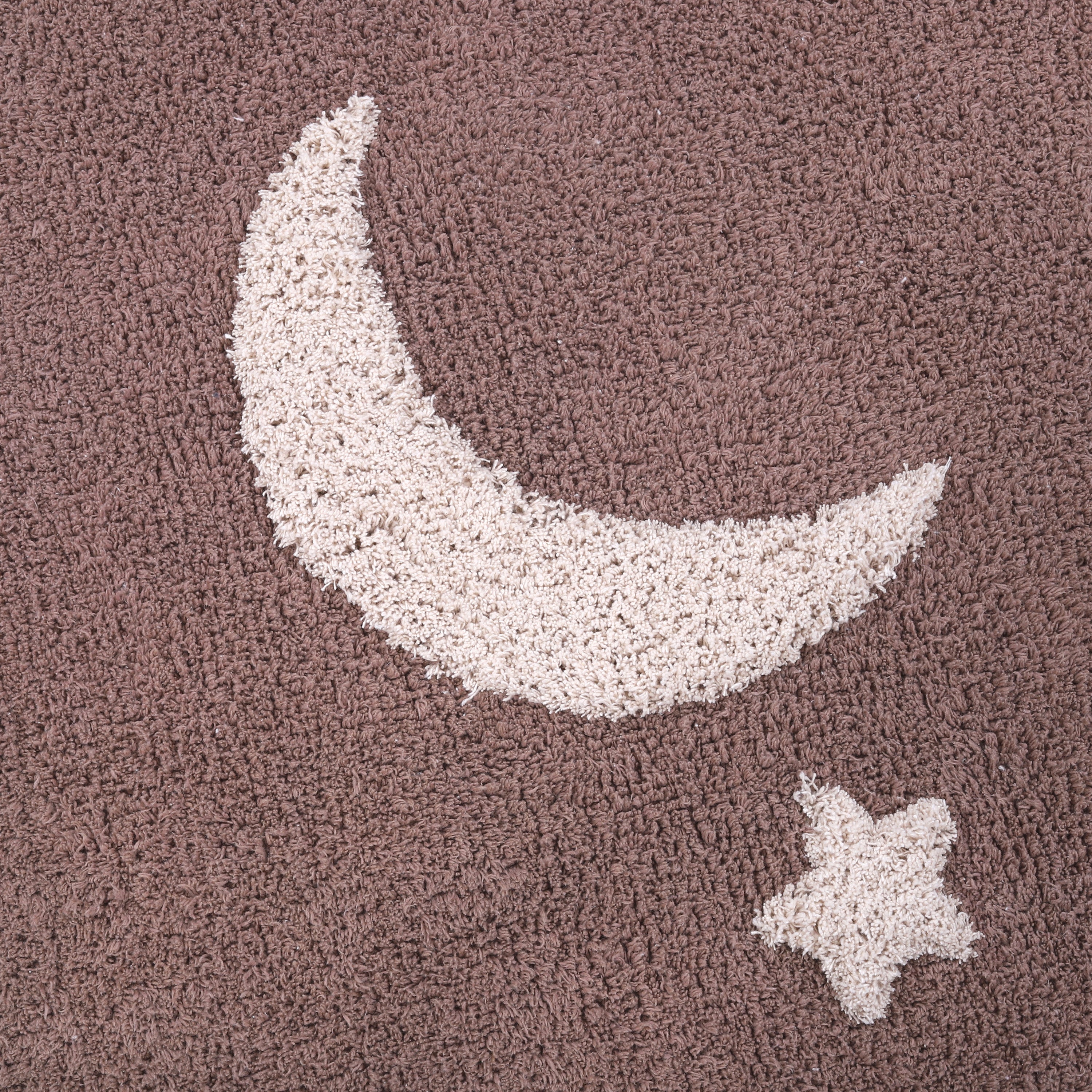 Moon and Stars speelkleed – zacht, veilig en dromerig ontwerp. Close-up foto.