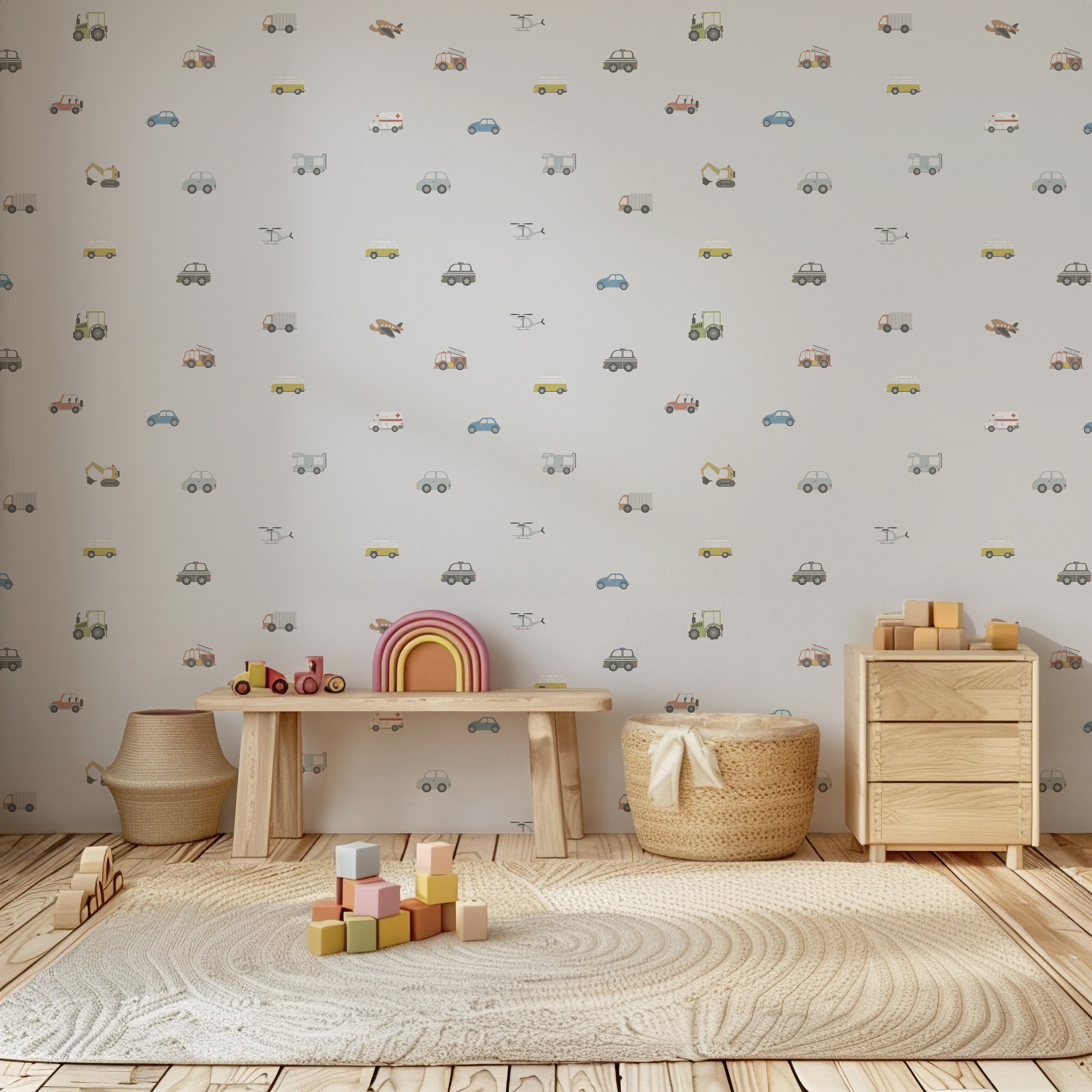 Grijs behang met vrolijke voertuigen zoals politieauto’s, brandweerwagens en vrachtwagens. Ideaal voor een stoere kinderkamer.