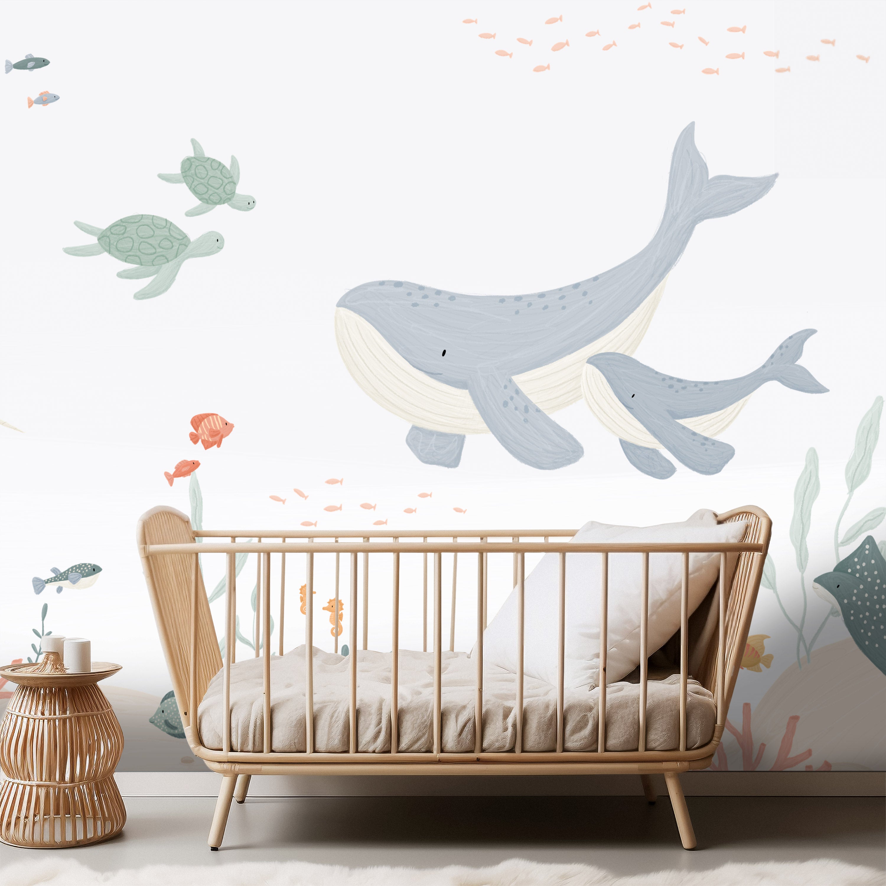 Waterwereld behang met walvissen en vissen in zachte blauwe tinten voor de kinderkamer